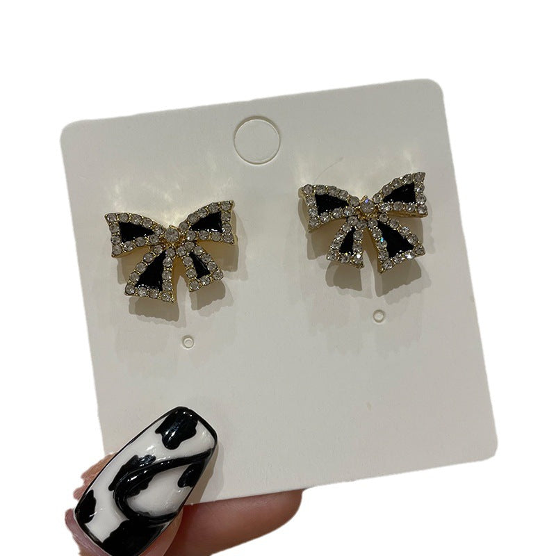 Wholesale Bow Oil Dripping Diamond Snowflake Earrings